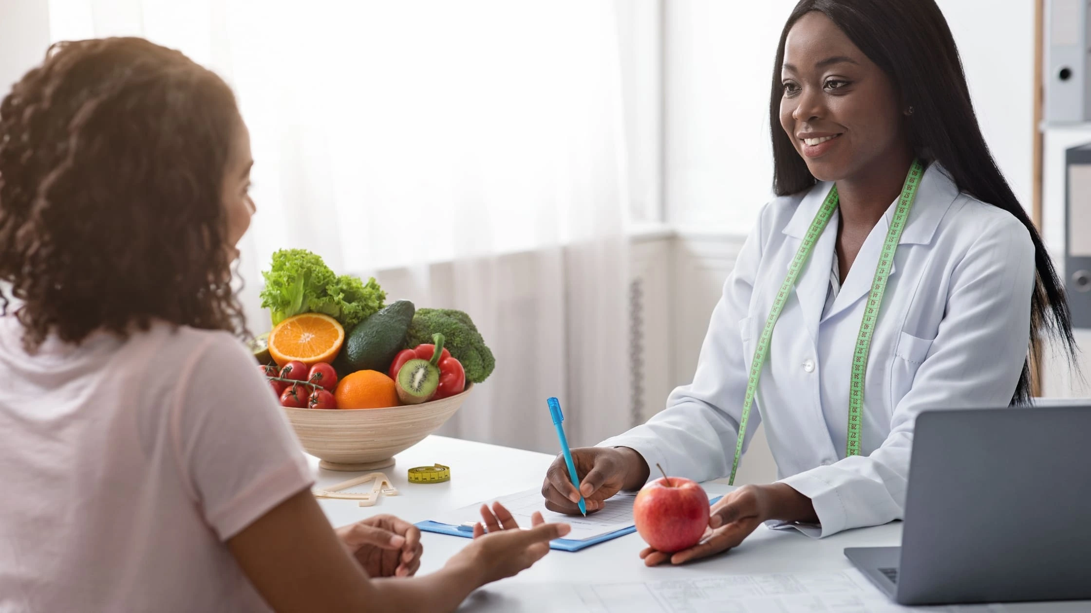 a doctor giving tips to her patient